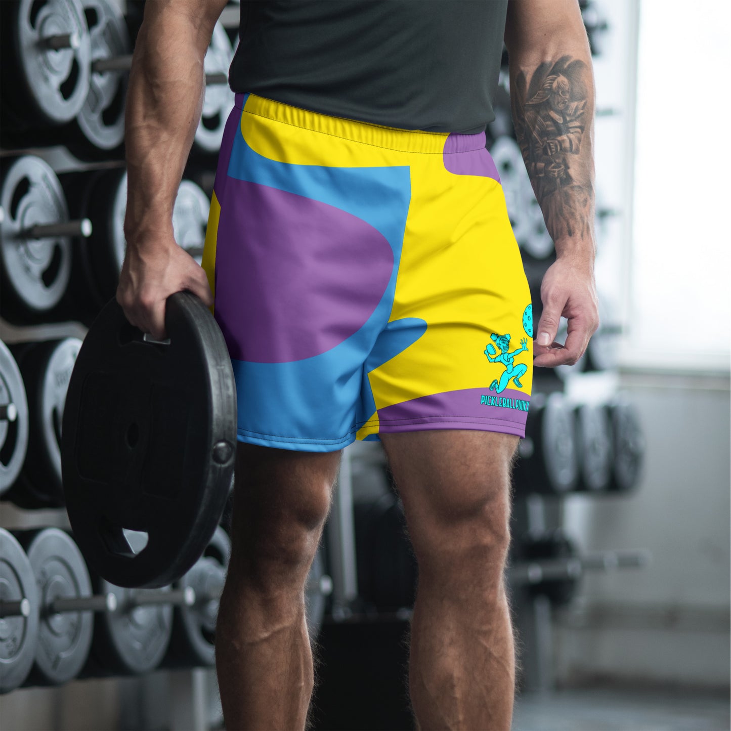 all-over-print-unisex-athletic-long-shorts view on male model
